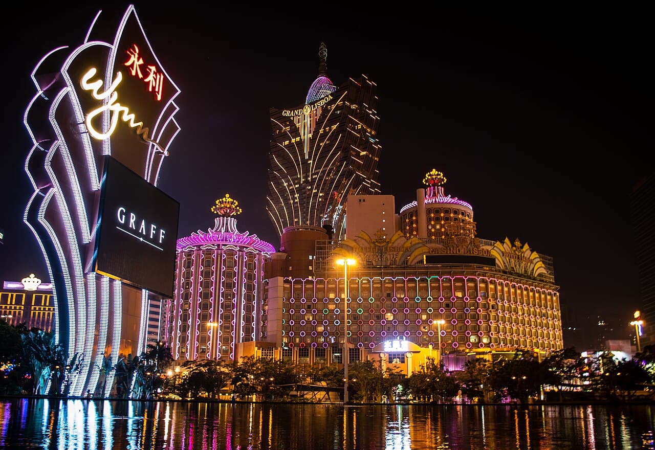 Macau's illuminated Casino Lisboa and Grand Lisboa buildings at night